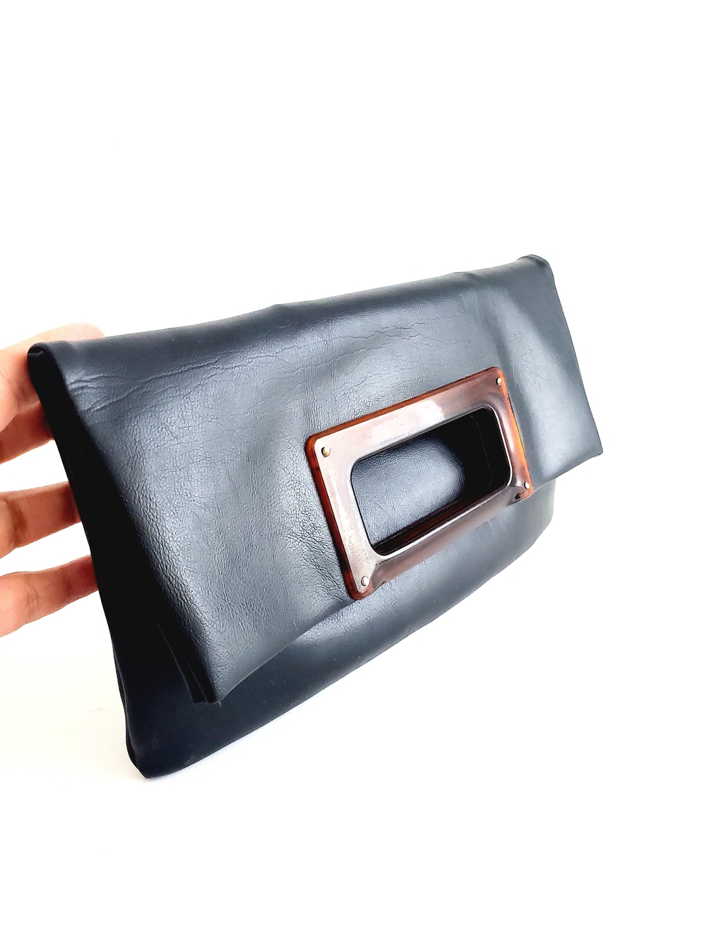 Sleek Black Fold-Over Clutch with Brown Accent Handle
